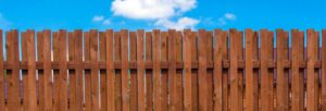 Marino lawyers stock image of brown fence with blue sky